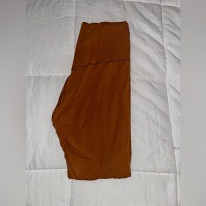 OFFLINE: Burnt orange colored leggings.